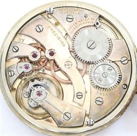 A Gruen 14k Gold Ultra Verithin "Precision" model pocket watch. 40mm, 17 j, Adj temp, SW, PS, 14 k White Gold, OF, Silvered dial with Gold tone Arabic numerals. Serial #549450. 41.1 grams total weight. Some wear and dial corrosion, monogrammed rear cover. Winds, sets and running when cataloged.