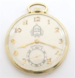 Hamilton 917 "Packard" 14k Gold Pocket Watch -12 size, 17 j, Adj 3 pos, DMK, SW, PS, Hamilton "Wadsworth" 14k Yellow Gold, OF, SSD Champagne dial w/Arabic numerals and "Ask The Man Who Owns One" Packard logo on dial. Serial #X42231. 48.8 grams total weight. Minor wear. Winds, sets and running when cataloged.