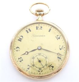 Longines 14k Gold Pocket Watch -
Longines, for "Guinand Bros. Ashland, MN" 14k Gold pocket watch. 12 size, 17 j, Adj 5 pos, DMK, SW, PS, Fancy Longines 14k Yellow Gold, OF, Gold tone dial w/Roman numerals. Serial #3019112. 52.3 grams total weight. Some wear, light dial corrosion. Winds, sets and running when cataloged.