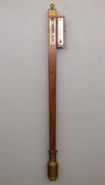 Mercury Stick Barometer -
A 1930's Stick Barometer. Single tube barometer with celluloid indicator dial. Mahogany case with hinged door and . Old finish with minor wear, untested. No Shipping - Contains Mercury. 37 1/2" high.