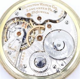 Hamilton 992 Railroad Watch - Hamilton 992 Railroad watch. 16 size, 21 j, Adj 5 pos, DMK, GJS, SW, LS, Wadsworth GF, BOC, Fixed bow, OF, DSD w/Arabic numerals. Serial #767485. Some case wear, hairline in crystal. Winds, sets and running when cataloged.