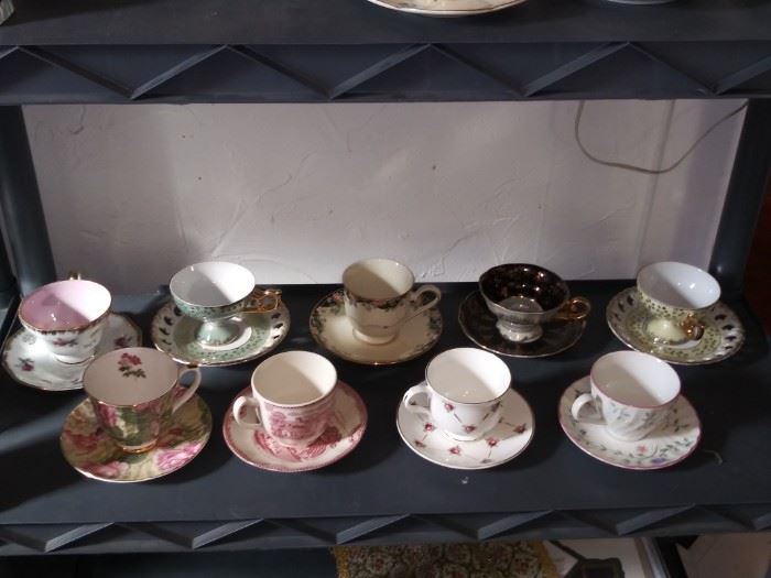 HIGH END CUPS AND SAUCERS