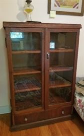 glass door book case with drawers