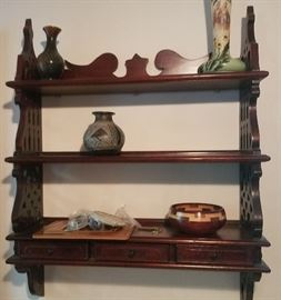 mahogany shelf with drawers