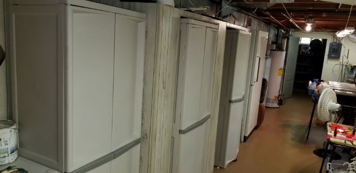 Sterilite storage shelving units lined up in the basement.