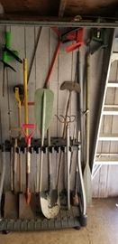 Yard tools, paddle, oars, aluminum ladder, etc.