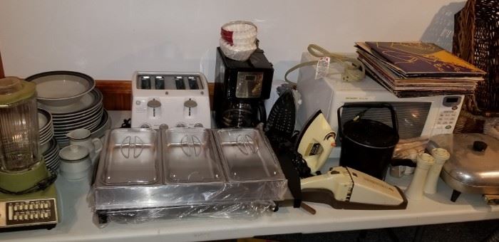 More household including a microwave and a heated serving unit/trays (unused)