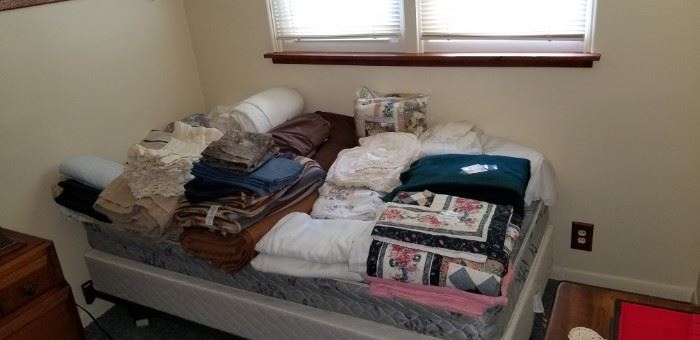 Linens placed on a twin size bed