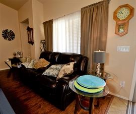 Rocking and Reclining/USB Port Sofa and 2 round side tables for sale. There is a matching round coffee table also.