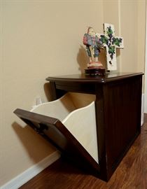 Dark brown cabinet that flips open in front. Great for a side table in bedroom or end table in livingroom.