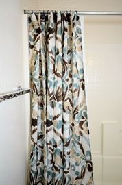 Shower curtains and rods for sale.