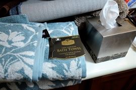 Brand new towels for sale. A variety of pretty Kleenex boxes.