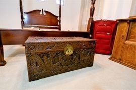 Gorgeous Queen Poster Bed and Hand Carved unusual wood trunk.