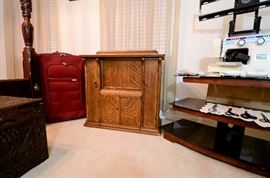 Like New red suitcase and the Antique Cabinet you will have to guess what that is or come to the sale and find out!