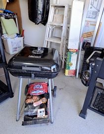 Small Grill and charcoal for sale. Ladders too!