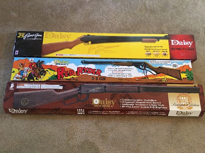 These BB guns and boxes are in pristine condition.