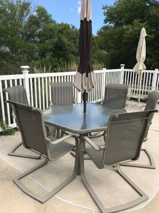 6 chairs, table, umbrella patio set (high end) Very very nice!