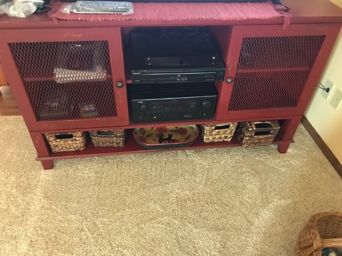 Stereo equipment and cabinet, baskets below