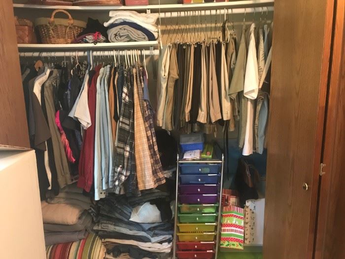 Several closets of high end clothing 