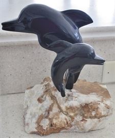 heavy stone with onyx dolphins