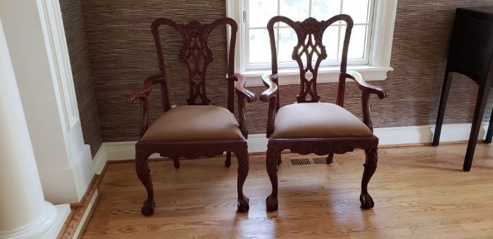 2 arm chairs belonging to dr  table