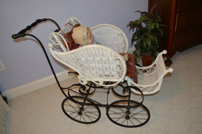Antique white wicker convertible baby carriage