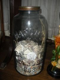 great old mason jar with seashells 