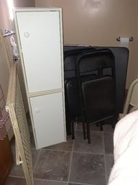 Storage cabinets, folding chairs and table