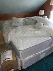 two twin beds with headboard/footboards, mattresses by Bamboo.
