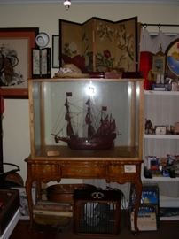 Model ship in glass case, vanity