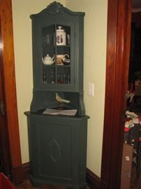Petite corner cabinet