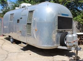 1964, 24-foot Airstream "radewind Land Yacht travel trailer in excellent condition. All this needs is a fridge and it will be ready to take on the road. The aluminum "skin" is in remarkably good condition and can be polished to a high gloss. This will not be half-price on Sunday. Cash payment only. Update! We will be accepting bids on the Airstream with a reserve of $10,000. Bids will be taken from the beginning of the sale on Thursday, September 20, to the close of the sale, 3:00 pm on Sunday, September 23, or you can “Buy It Now” for $20,000 at which time the bidding will end. It will not go to half price on Sunday.