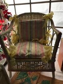 Adorable painted  childs vintage wicker chair with hand made cushions