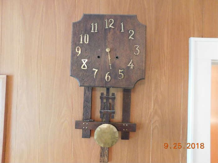 Old arts and crafts wall clock.