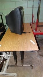 Table, school desk, and tv