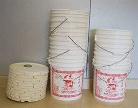Stack of White 5 Gallon Buckets with Lids