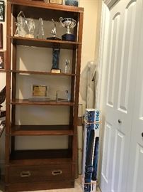MAHOGANY BOOKCASE W/5 SHELVES, ONE DRAWER. Brass Accents. Width: 30”. Height: 78”. Depth: 13”. Drawer is 18” x 27”. 