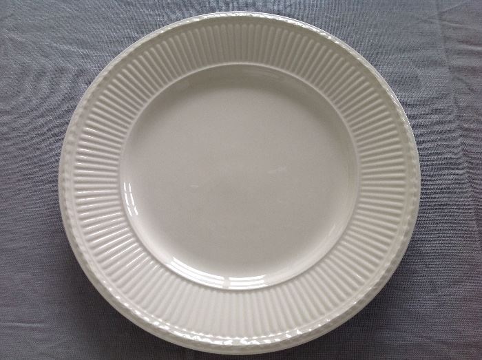 4 Edme by Wedgewood creme color dinner plates. In very good condition. No chips. 
