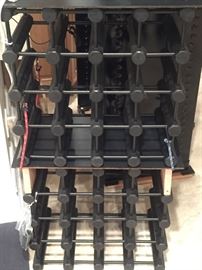 2 stacked wood black wine racks. 