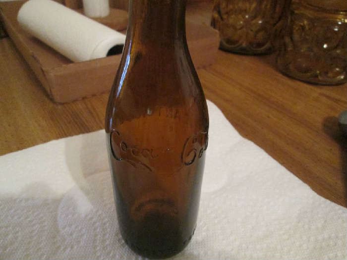 Vintage brown Coca-Cola bottle  Canton Bottling Co.
