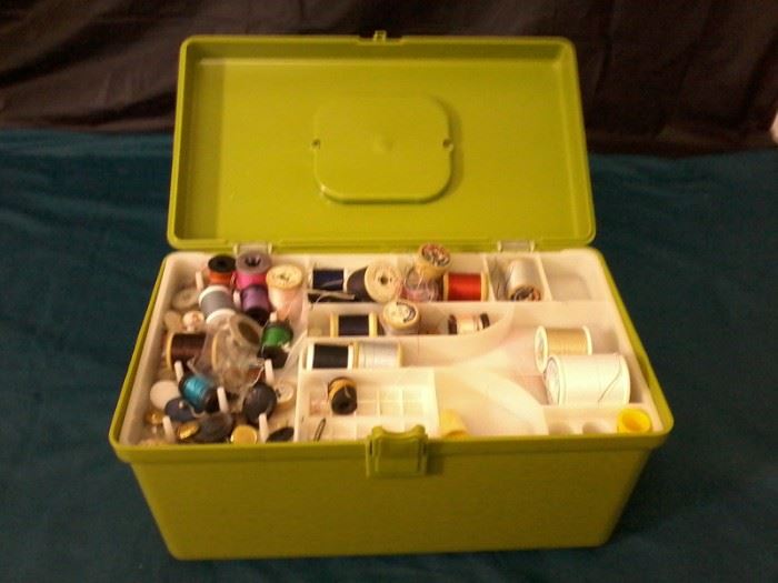  Plastic Sewing Box with accessories  http://www.ctonlineauctions.com/detail.asp?id=760043