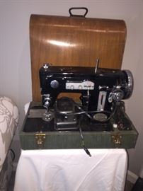 Vintage sewing machine with custom case