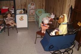 1920'S METAL BABY CARRIAGE--TRAP DOOR IN FRONT--ORIGINAL BLUE PAINT WITH PULL DOWN CANVAS TOP--METAL DOLL BEDS AND HI CHAIR--NICE AND CUTE STENCILS ON THEM----4 SCHOOL KIDS CHAIRS