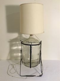 Glass Bottle Lamp with Metal Stand https://ctbids.com/#!/description/share/49304