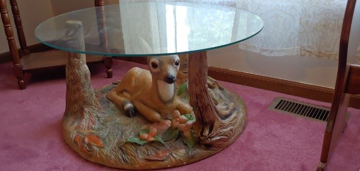 Yes, a porcelain deer under a coffee table
