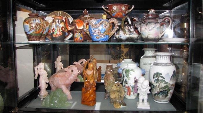 Large selection of Asain Pottery, sculptures, figurines. 