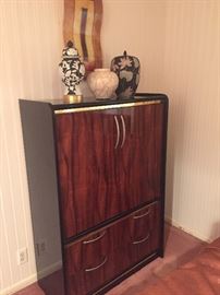 low enameled and wooden veneered low cabinet