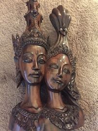 very large carved wooden statue of two women--I think these were made to hold incense