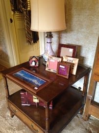 Side table, lamp, and frames