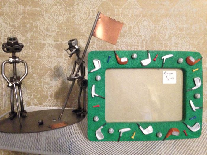 Golfing sculpture and frame